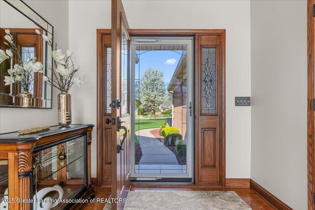 3012 Appaloosa Way, Lansing, MI 48906 - foyer featuring baseboards and wood finished floors