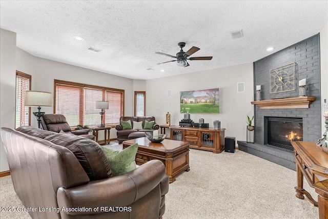 3012 Appaloosa Way, Lansing, MI 48906 - living room featuring visible vents, a healthy amount of sunlight, and light carpet