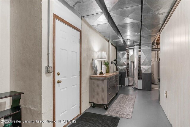 3012 Appaloosa Way, Lansing, MI 48906 - hall with finished concrete floors and heating unit