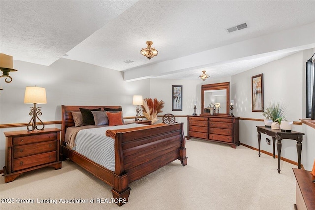 3012 Appaloosa Way, Lansing, MI 48906 - bedroom with baseboards, light carpet, a textured ceiling, and visible vents