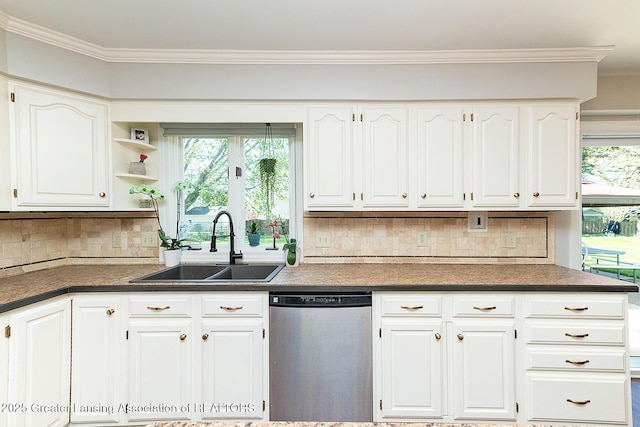 kitchen with dishwasher, a sink, dark countertops, crown molding, and decorative backsplash