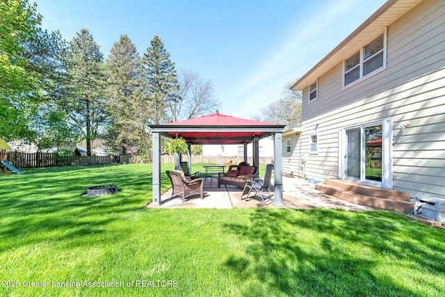 view of yard featuring a gazebo, entry steps, a patio area, a playground, and an outdoor hangout area