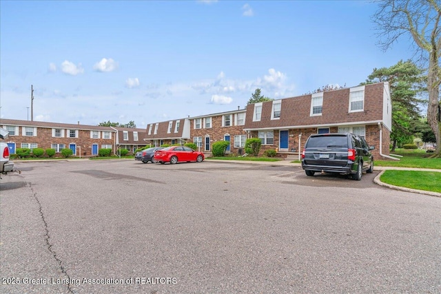 exterior space with uncovered parking