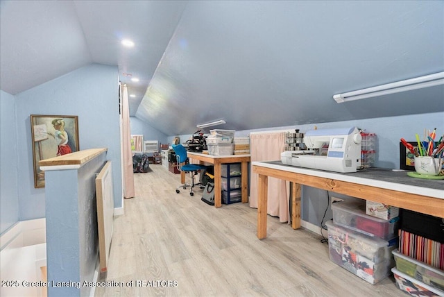 office space featuring wood finished floors and lofted ceiling