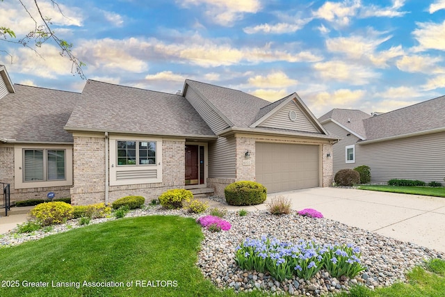 6032 Vienna Way, Lansing, MI 48917 - ranch-style house with brick siding, a garage, roof with shingles, and concrete driveway