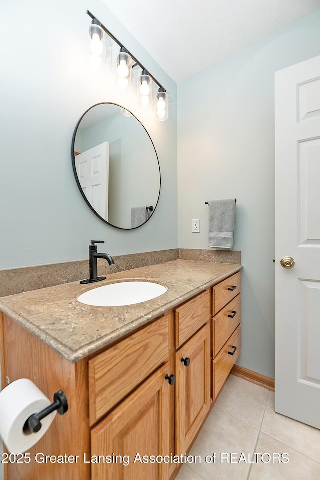 6032 Vienna Way, Lansing, MI 48917 - bathroom with tile patterned flooring and vanity