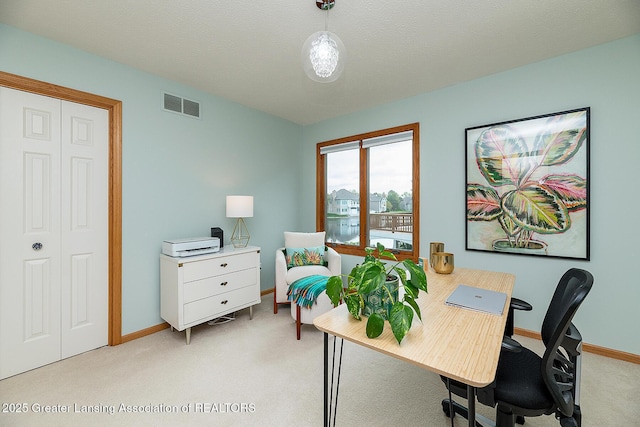 6032 Vienna Way, Lansing, MI 48917 - home office featuring baseboards, light colored carpet, and visible vents