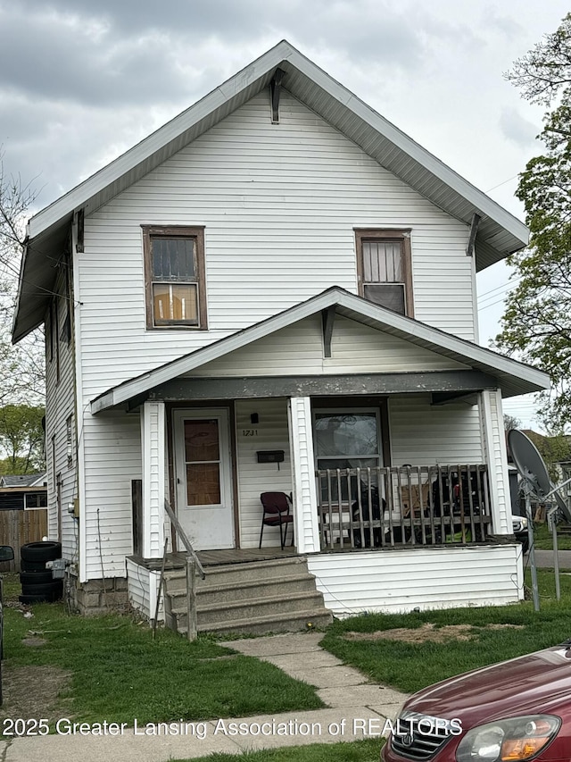 view of front of property featuring covered porch