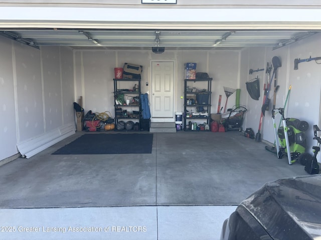 850 Saint Johns Chase, Grand Ledge, MI 48837 - view of garage
