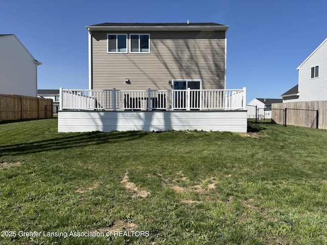 850 Saint Johns Chase, Grand Ledge, MI 48837 - back of property with a deck