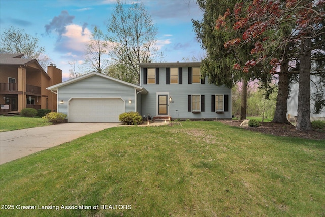 1212 Sandhill Dr, Dewitt, MI 48820 - colonial home featuring concrete driveway, a front yard, and a garage