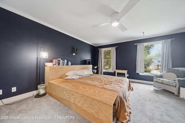 1212 Sandhill Dr, Dewitt, MI 48820 - carpeted bedroom with multiple windows, baseboards, a ceiling fan, and crown molding