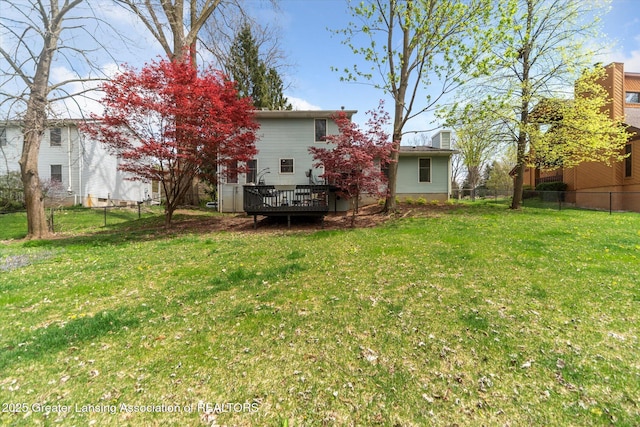 1212 Sandhill Dr, Dewitt, MI 48820 - view of yard with a deck and fence