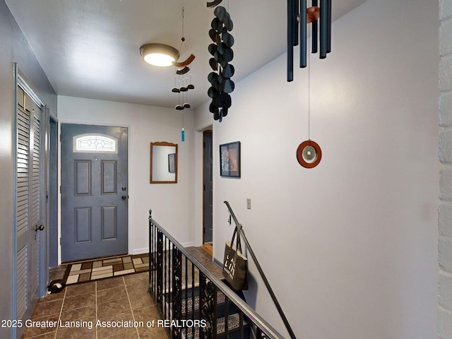 view of tiled foyer entrance