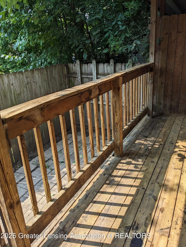 wooden deck featuring fence