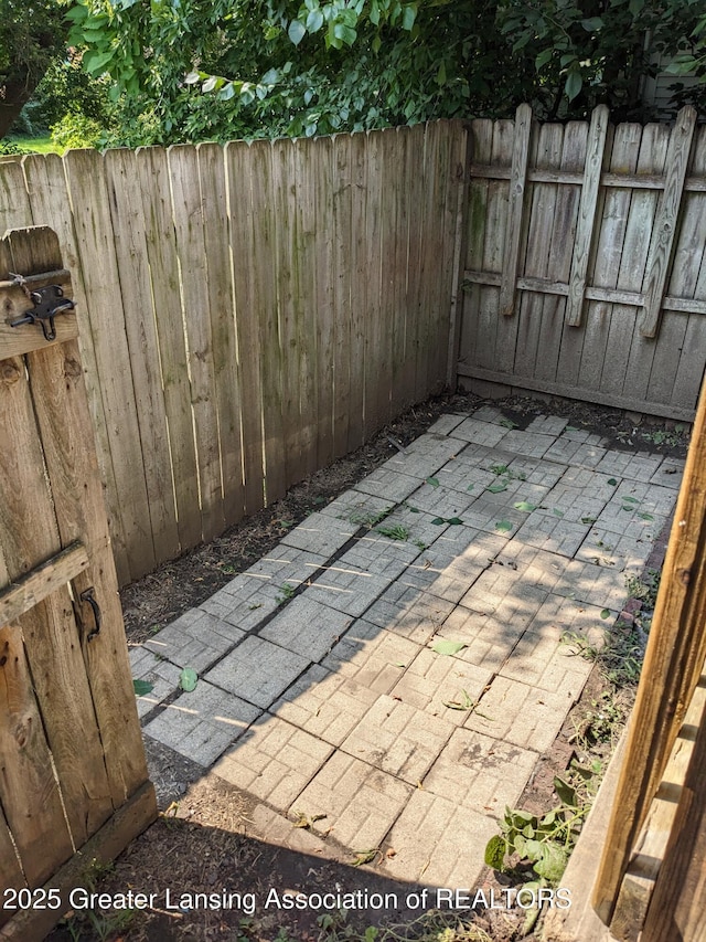 view of patio / terrace with fence