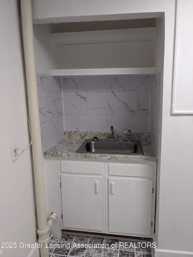 bar featuring a sink