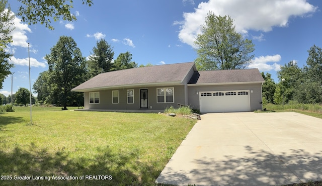 5205 N Bailey Rd, Coral, MI 49322 - view of front facade featuring a garage, a front lawn, and concrete driveway