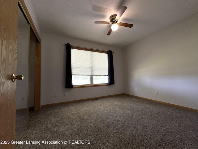 5205 N Bailey Rd, Coral, MI 49322 - carpeted empty room with a ceiling fan and baseboards