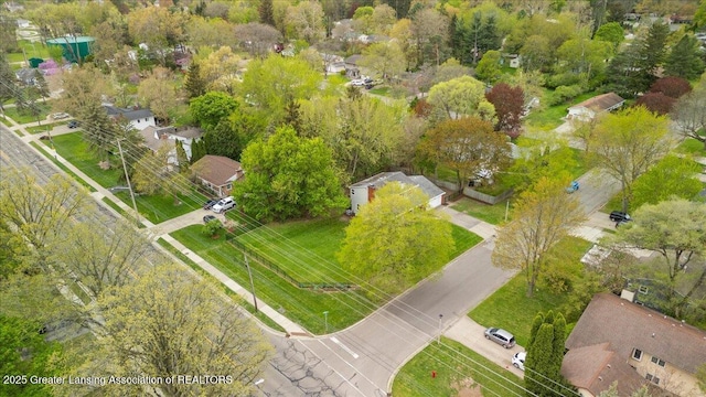 birds eye view of property with a residential view