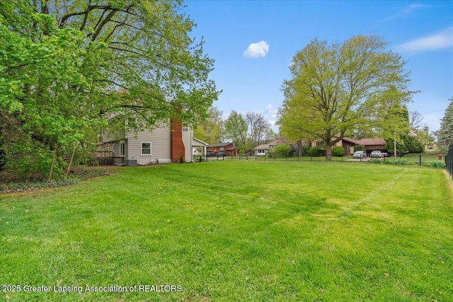 view of yard with fence