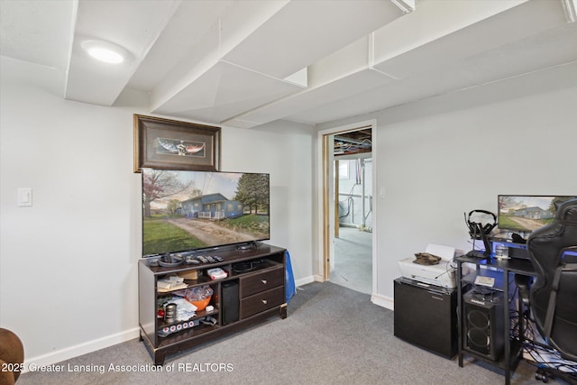 carpeted office space featuring baseboards