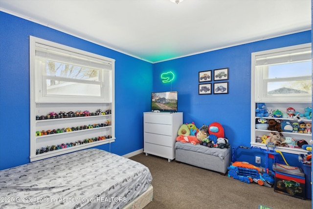 carpeted bedroom with crown molding
