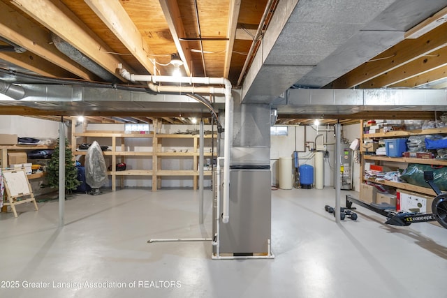 unfinished below grade area with water heater and heating unit