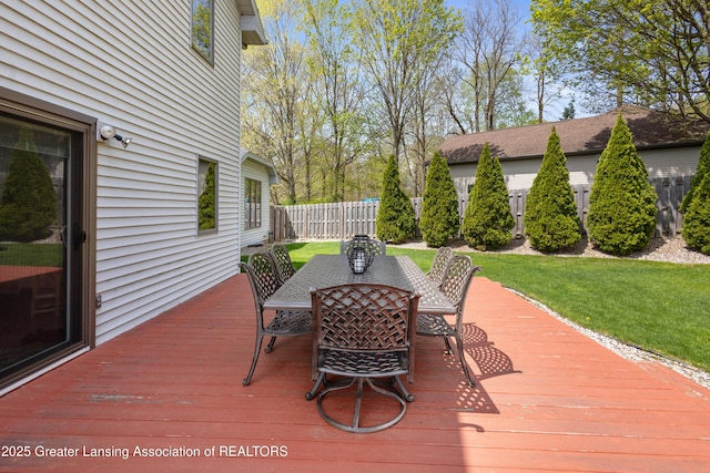 wooden terrace featuring outdoor dining area