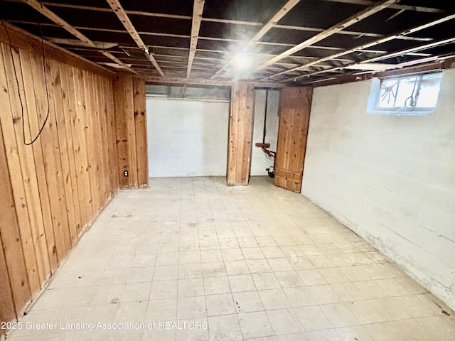 basement featuring tile patterned floors