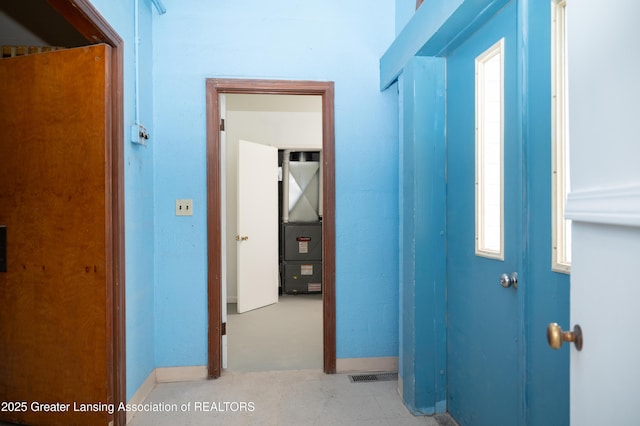corridor with baseboards
