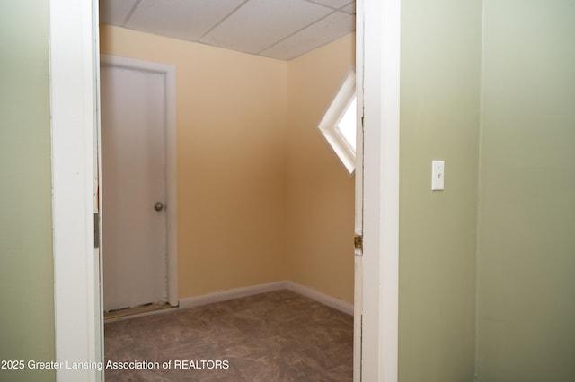 additional living space with carpet floors and baseboards