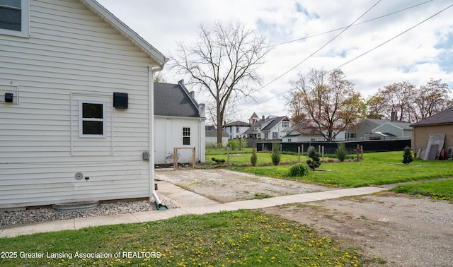 view of yard featuring a residential view