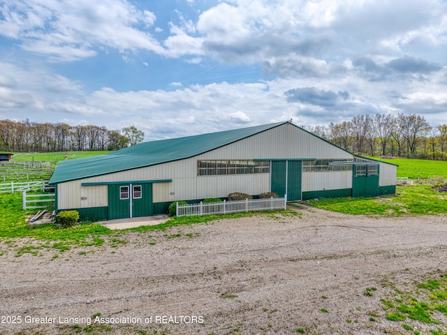 2820 N Lima Center Rd, Dexter, MI 48130 - view of pole building with fence and dirt driveway