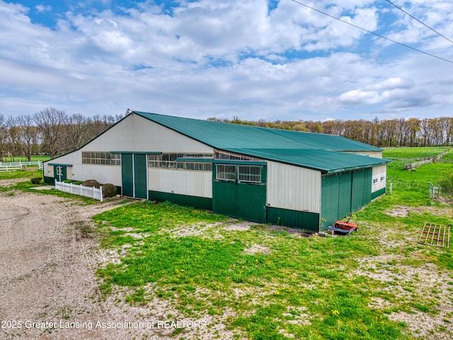 2820 N Lima Center Rd, Dexter, MI 48130 - view of pole building featuring fence and dirt driveway