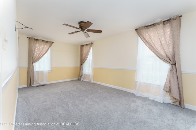 2820 N Lima Center Rd, Dexter, MI 48130 - carpeted empty room with baseboards and ceiling fan
