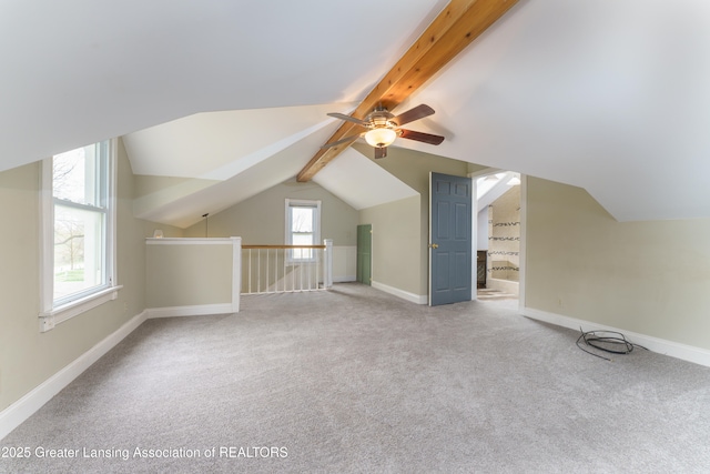 2820 N Lima Center Rd, Dexter, MI 48130 - bonus room with carpet, a ceiling fan, baseboards, and lofted ceiling with beams