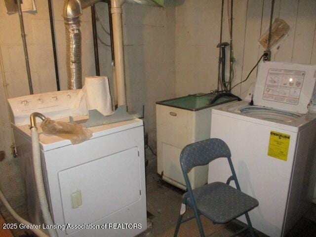 laundry room with washer and dryer