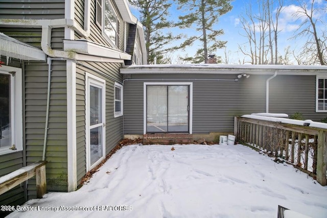 view of snow covered deck