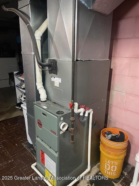 6422 E Saginaw Hwy, Grand Ledge, MI 48837 - utility room with heating unit
