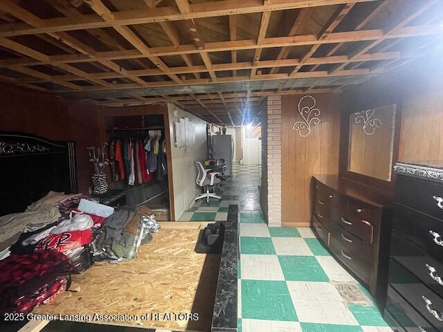 6422 E Saginaw Hwy, Grand Ledge, MI 48837 - bedroom featuring tile patterned floors and a closet