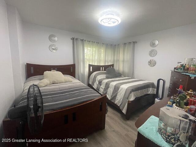 6422 E Saginaw Hwy, Grand Ledge, MI 48837 - bedroom with wood finished floors