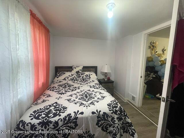 6422 E Saginaw Hwy, Grand Ledge, MI 48837 - bedroom with wood finished floors