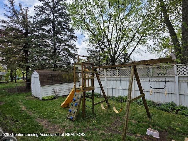 view of play area featuring a storage unit and an outdoor structure