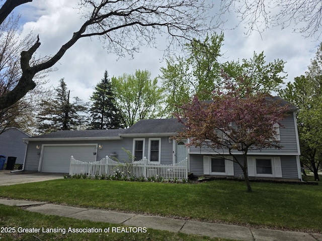 view of front of property featuring an attached garage and concrete driveway