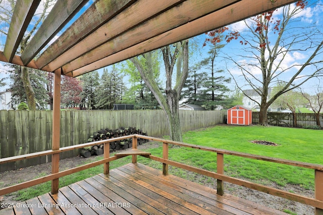 910 Pecos Dr, Lansing, MI 48917 - wooden terrace with a storage unit and an outdoor structure
