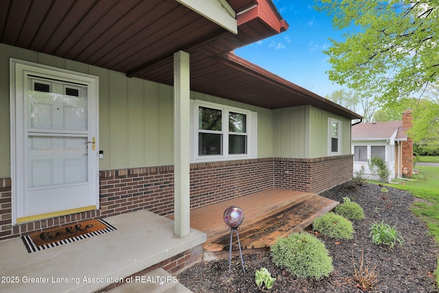 910 Pecos Dr, Lansing, MI 48917 - entrance to property featuring brick siding