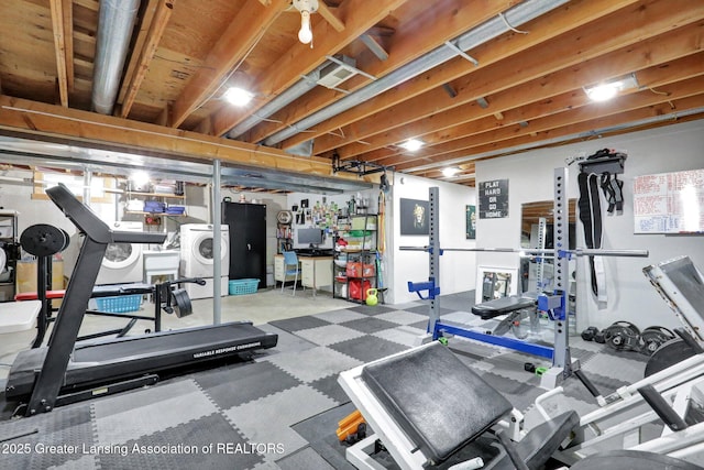 910 Pecos Dr, Lansing, MI 48917 - workout room featuring washer / dryer