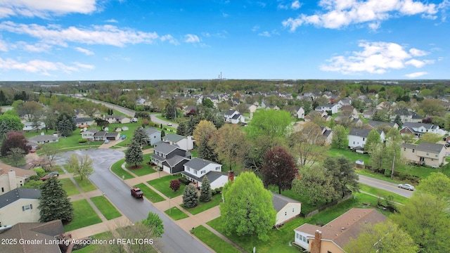 910 Pecos Dr, Lansing, MI 48917 - aerial overview of property's location featuring nearby suburban area