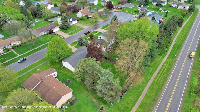 910 Pecos Dr, Lansing, MI 48917 - aerial overview of property's location with nearby suburban area